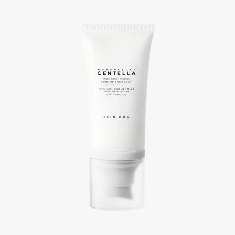 White minimalist tube of Centella Madagascar sunscreen, labeled Tone Brightening, with 50 ml capacity.