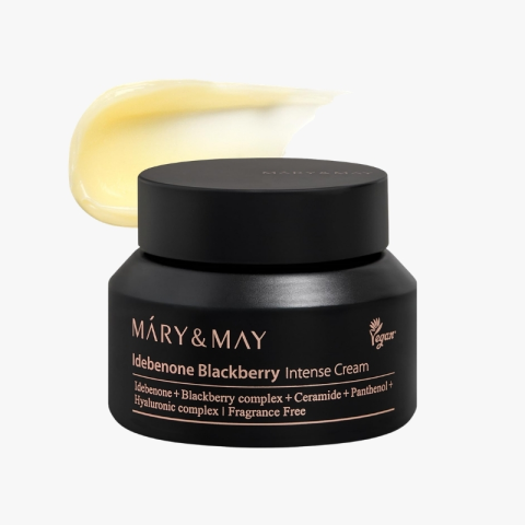Mary & May Idebenone Blackberry Intense Cream in a black jar with a pale cream swatch on the lid, labeled vegan and fragrance-free.