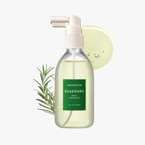 Spray bottle of Aromatica Rosemary Root Enhancer with a green label; rosemary sprig beside it.