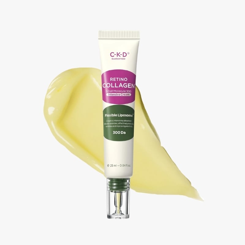 Tube of C-K-D Retino Collagen Intensive Cream with a smear of yellow cream behind it on a light background, showcasing the product label.