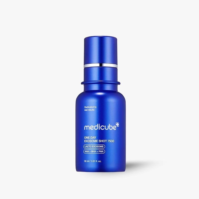 Blue skincare serum bottle with pump dispenser, labeled 'medicube' and 'One Day Exosome Shot 7500' on white background.