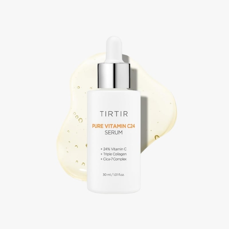 TIRTIR Pure Vitamin C24 Serum bottle with dropper, white container on a pale background with a beige cream smear behind it.