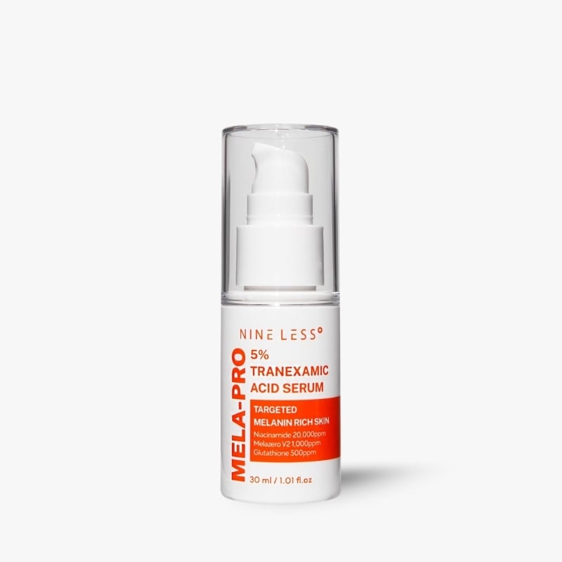 White pump bottle of MELA-PRO 5% Tranexamic Acid Serum for melanin-rich skin, 30 ml, with orange label on a white background.