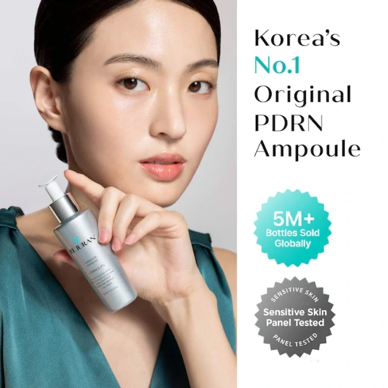 Woman holding a silver PDRN ampoule bottle; advertisement text reads 'Korea's No.1 Original PDRN Ampoule' with teal badge and 'Sensitive Skin Panel Tested' seal.