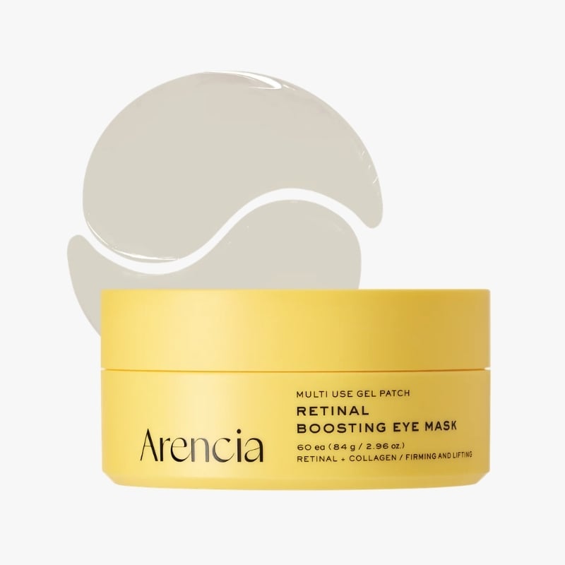 Yellow jar of retinal boosting eye mask with soft-gray gel patches behind it.