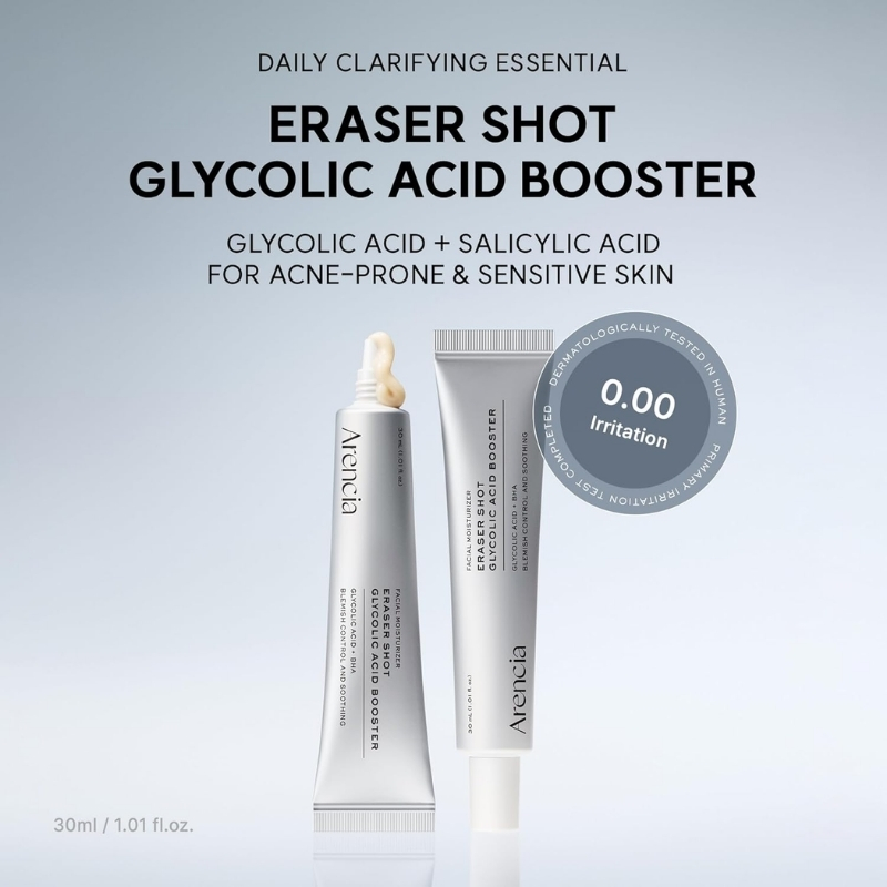 Product image of Arencia Eraser Shot Glycolic Acid Booster tubes against a light blue gradient, highlighting glycolic and salicylic acids for acne-prone/sensitive skin with 0.00 irritation badge.