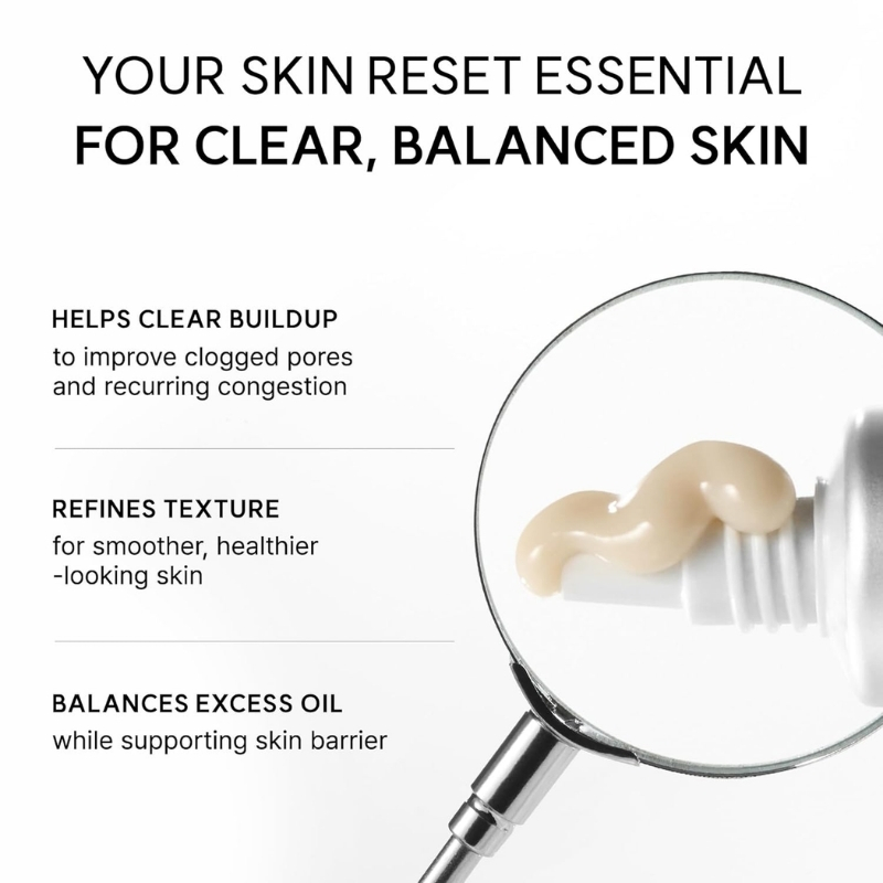 Promotional skincare infographic showing a dab of cream beside a magnifying glass; headings read 'Your skin reset essential for clear, balanced skin' with sections 'Helps clear buildup', 'Refines texture', 'Balances excess oil'