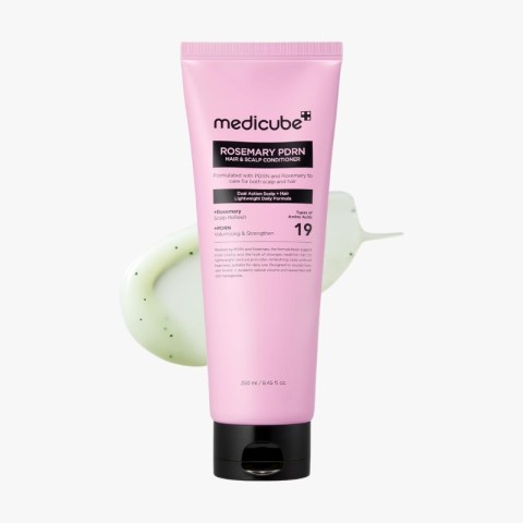 Pink tube of medicube Rosemary PDRN hair & scalp conditioner with black cap, label visible on front.