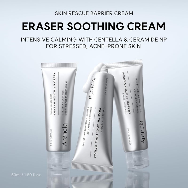 Three silver tubes labeled Eraser Soothing Cream on a light blue background, with a dollop of cream on the center tube.