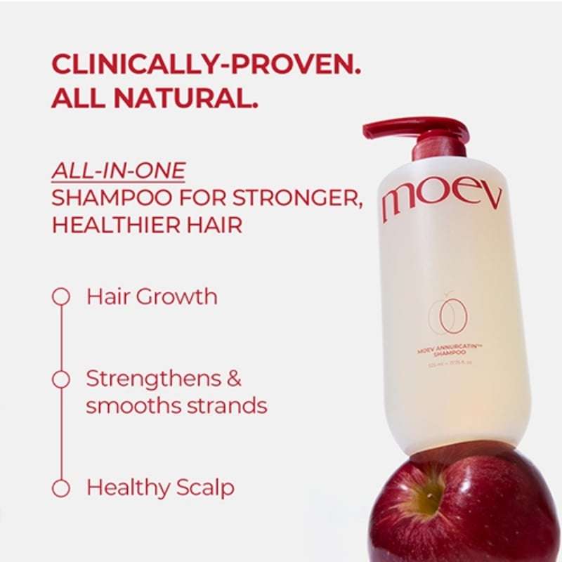 Moov shampoo advertisement showing a bottle balanced on a red apple with the slogan 'Clinically-Proven. All Natural.' and bullet points: Hair Growth; Strengthens & smooths strands; Healthy Scalp.