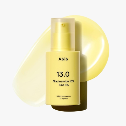 Yellow Abib 13.0 Bright Force Serum bottle with pump, label reads Niacinamide 10% TXA 3% (front view).