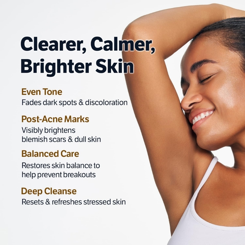 Smiling woman with her arm raised; skincare ad promoting clearer, calmer, brighter skin with even tone and deep cleanse benefits.